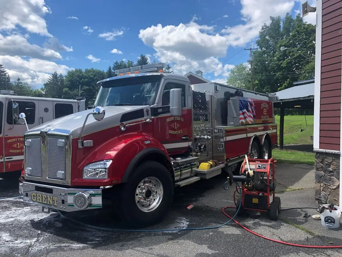 Engine-Tanker 22-35 on the Apron — Three-quarter profile of 22-35 ('The Beast') parked outside Station 1 on a sunny afternoon.
