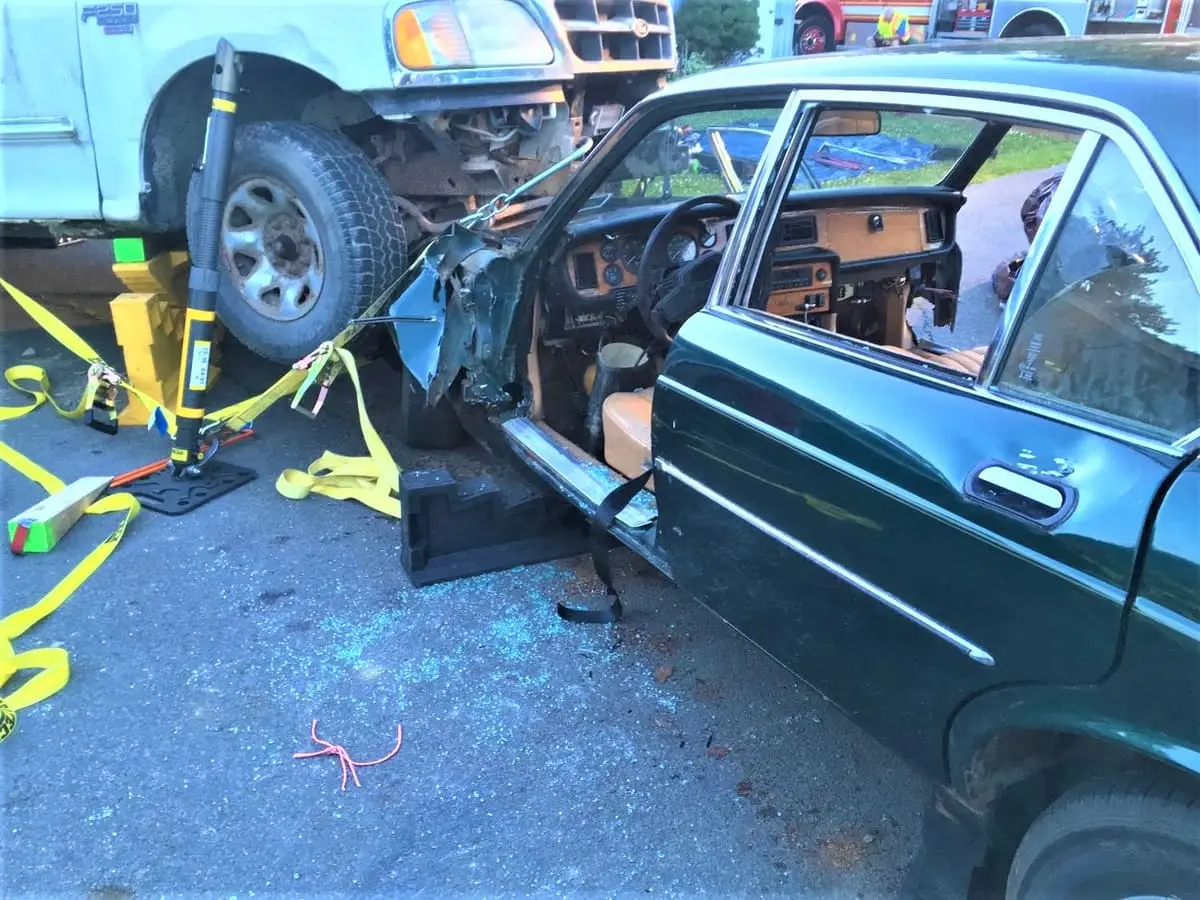 Ghent firefighters practicing hands-on auto extrication training