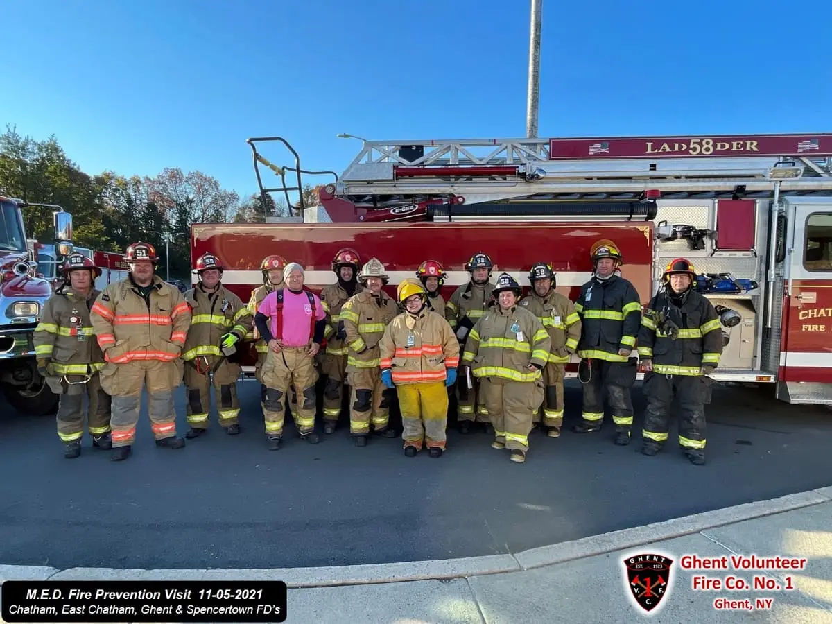Ghent volunteers teaching fire prevention to elementary students