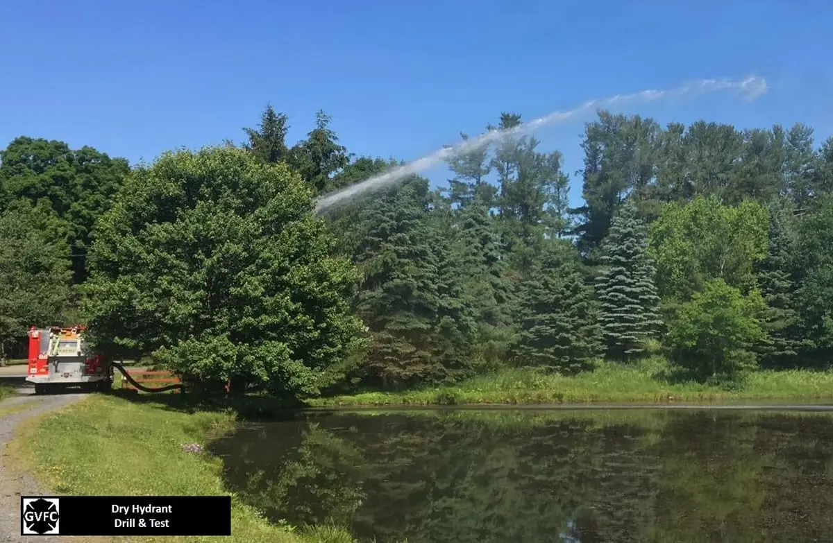 Ghent firefighters operating rural water supply and dry hydrant drill