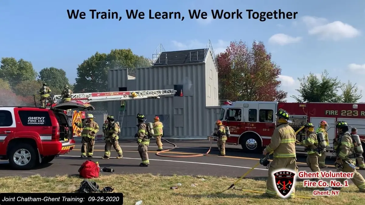 Ghent firefighters during live fire prevention and burn tower training