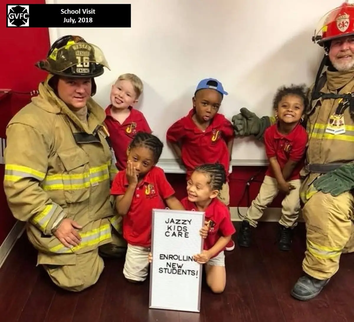 Ghent firefighters answering questions with community members